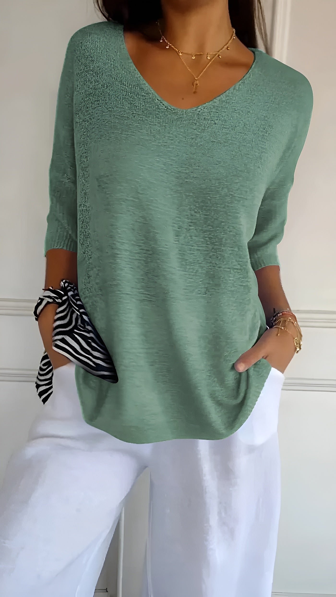 Isabella – Zachte Gebreide Dames Top met V-Hals en Mouwloos Design