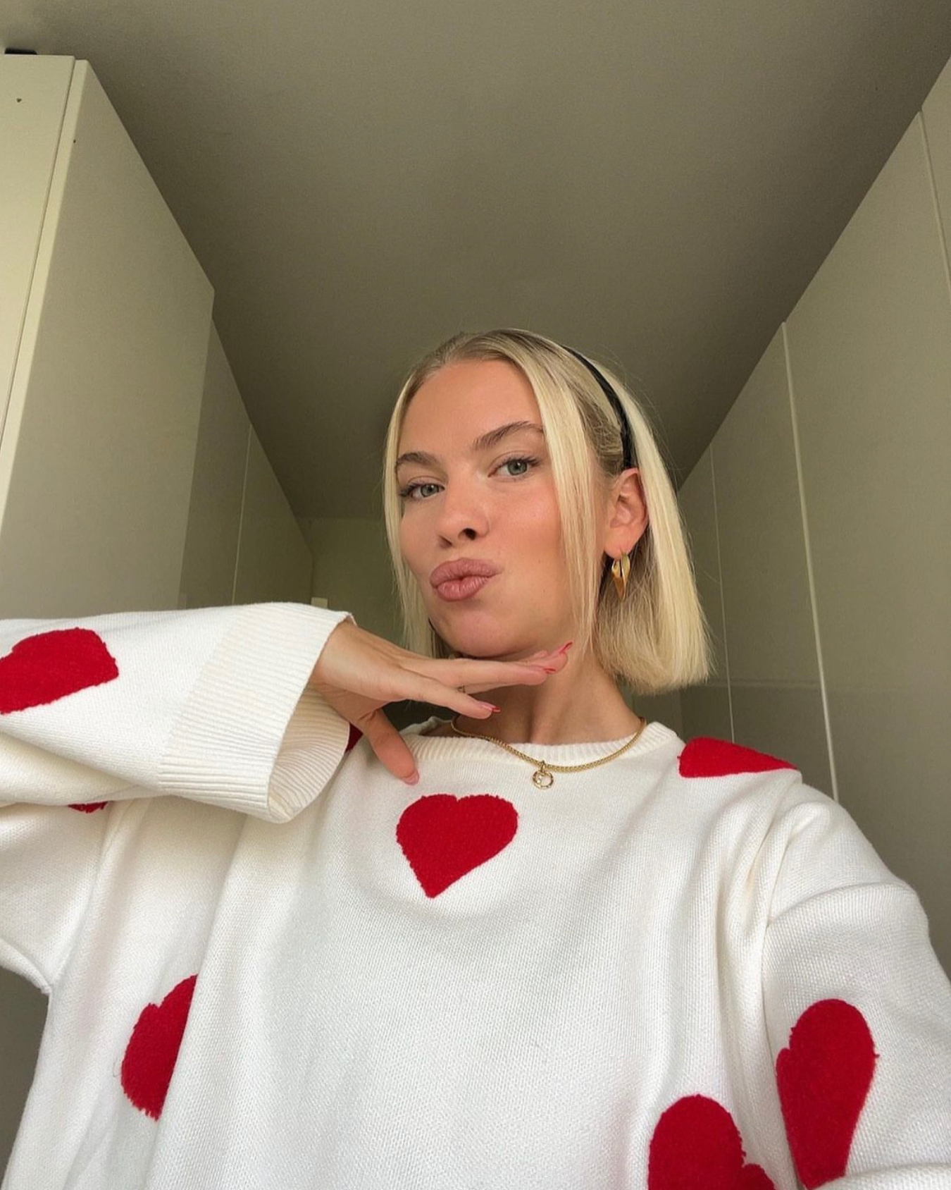 AlessiaSoffio™ Oversized Dames trui met hartjes