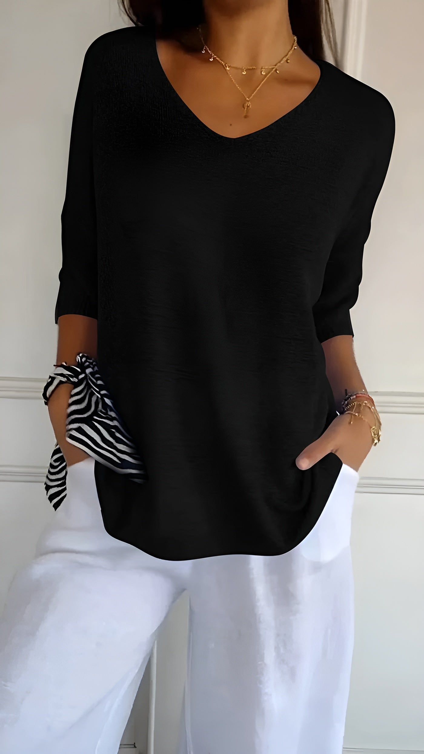 Isabella – Zachte Gebreide Dames Top met V-Hals en Mouwloos Design