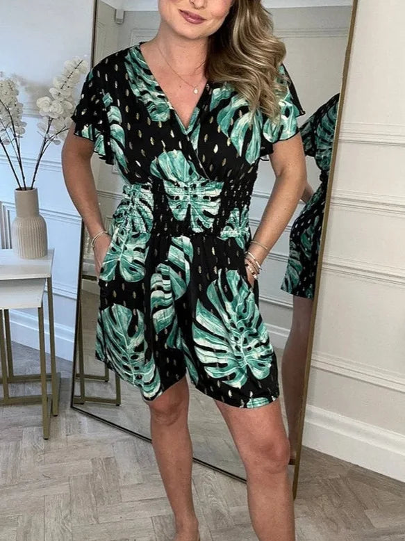 Lucía – V-Hals Dames Jumpsuit met Bladerenprint voor de Zomer